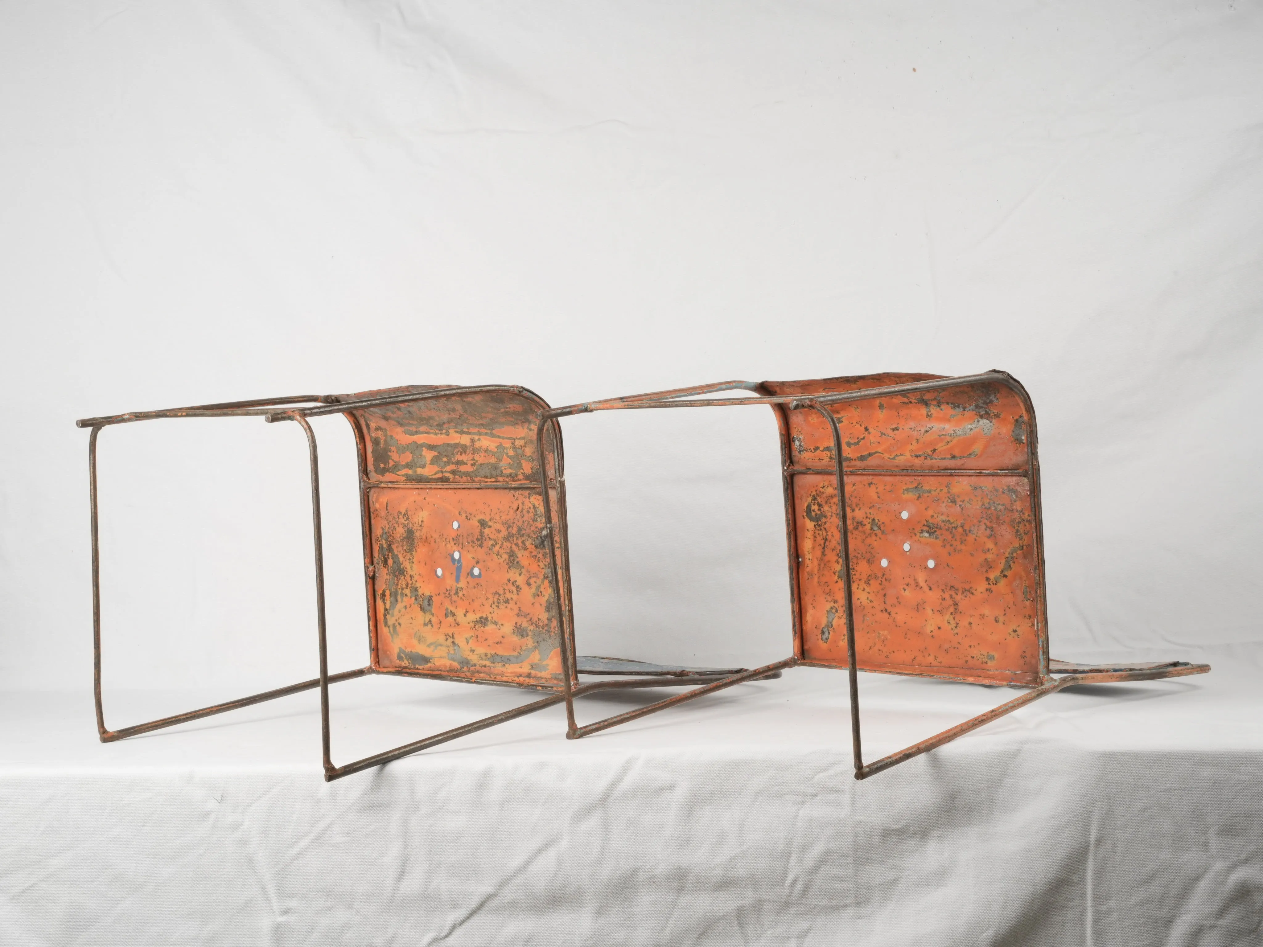 Pair of industrial metal garden chairs w/ blue patina