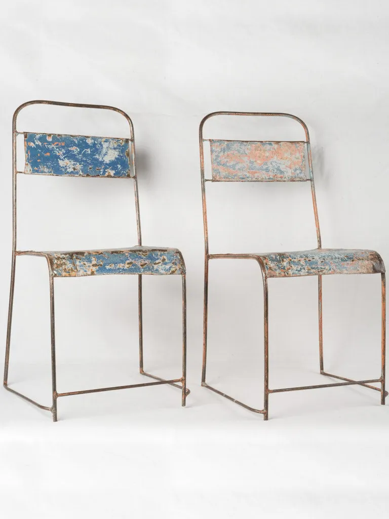 Pair of industrial metal garden chairs w/ blue patina