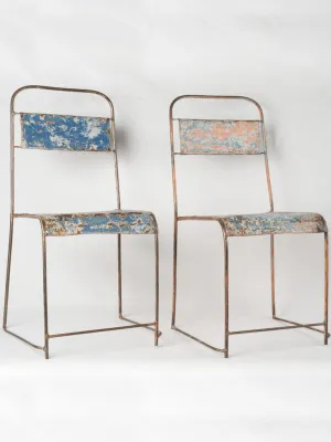 Pair of industrial metal garden chairs w/ blue patina