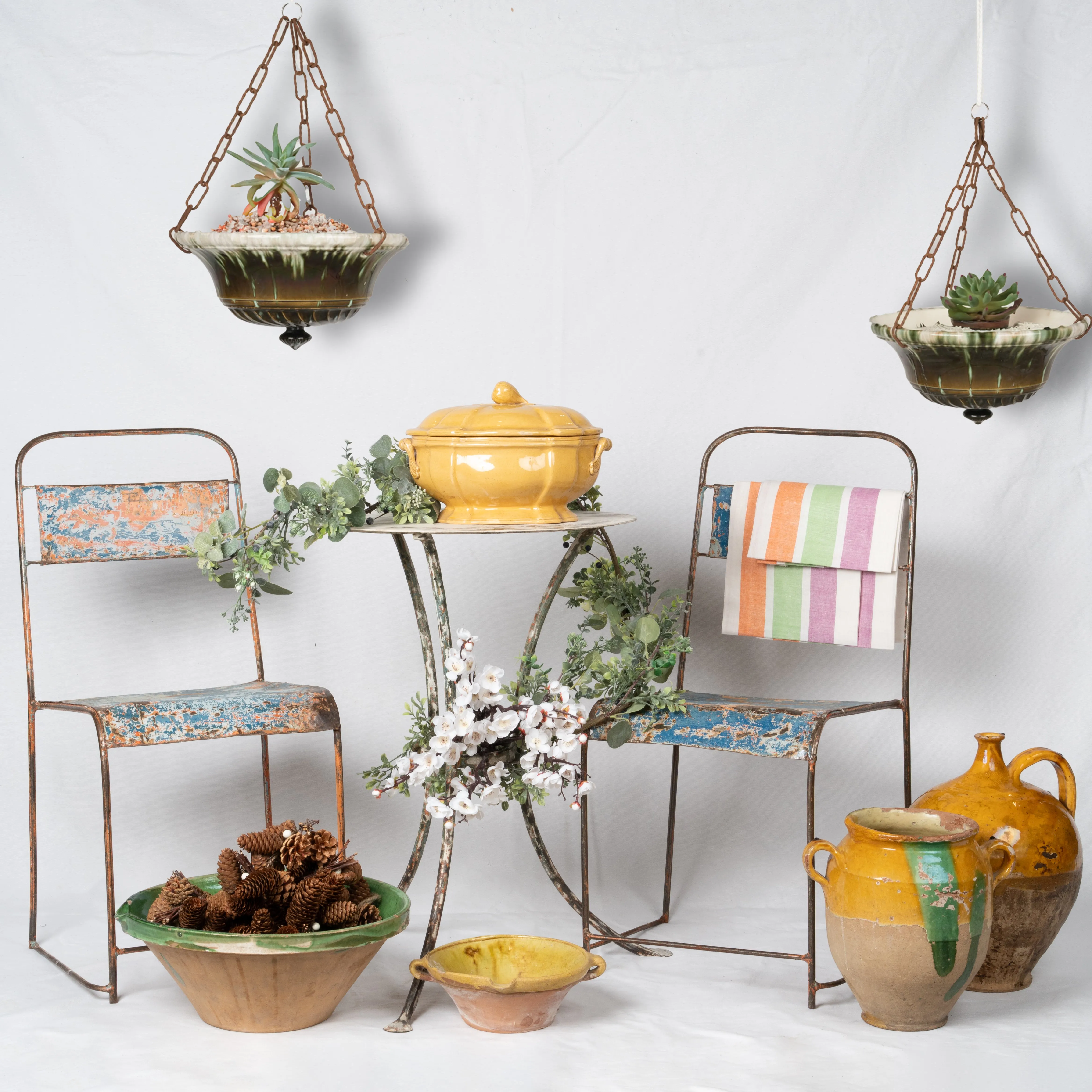 Pair of industrial metal garden chairs w/ blue patina